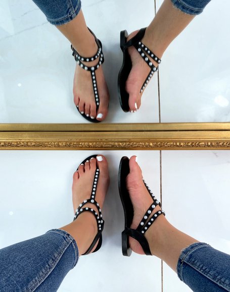 Black flat sandals with beaded between-fingers