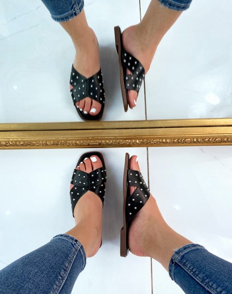 Black flat sandals with crisscross studded straps
