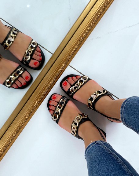 Black flat sandals with gold and leopard details