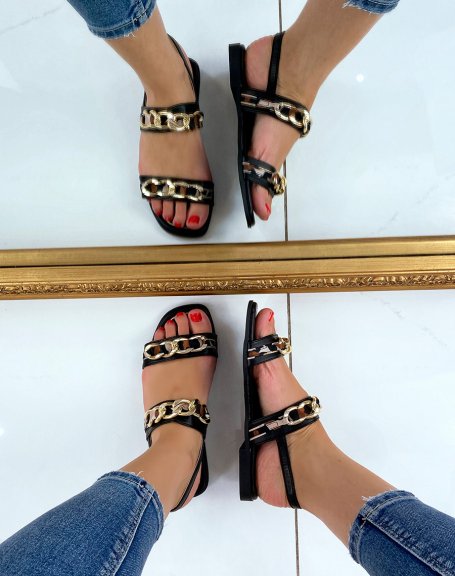 Black flat sandals with gold and leopard details