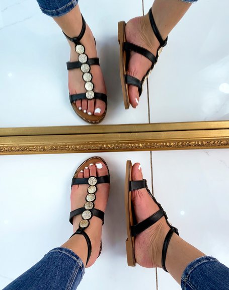 Black flat sandals with gold pieces