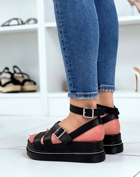 Black flat sandals with multiple adjustable straps