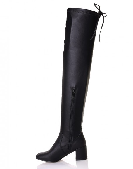 Black flexible thigh-high boots with mid heels
