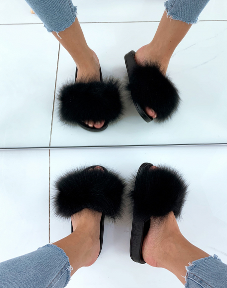 Black fur mules with chunky soles