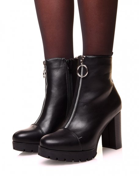 Black heeled ankle boot with zipper at the front