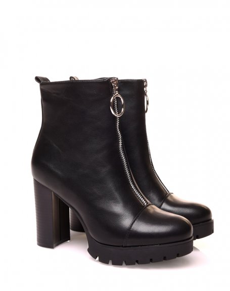 Black heeled ankle boot with zipper at the front