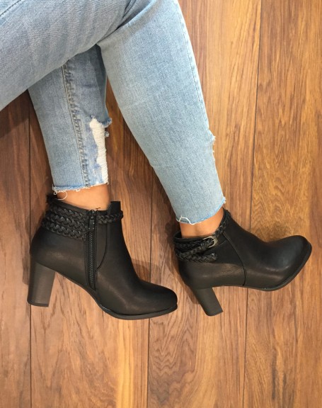 Black heeled ankle boots with braided straps