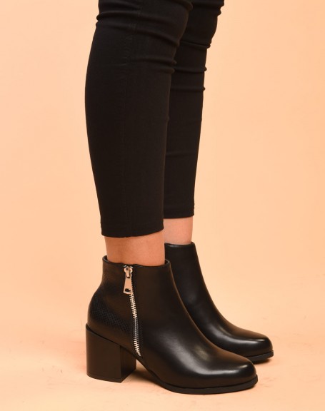 Black heeled ankle boots with closure & python patterns