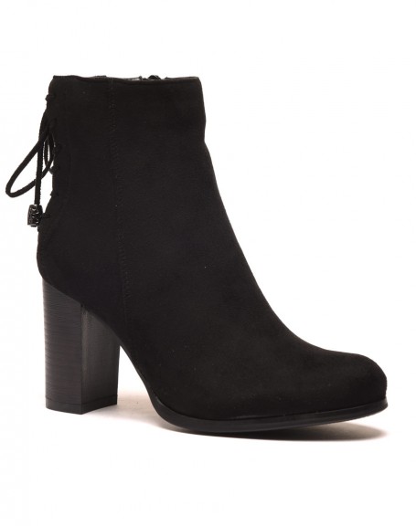 Black heeled ankle boots with decorative lace up back