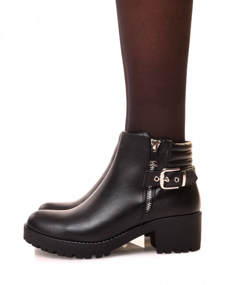 Black heeled ankle boots with decorative zip