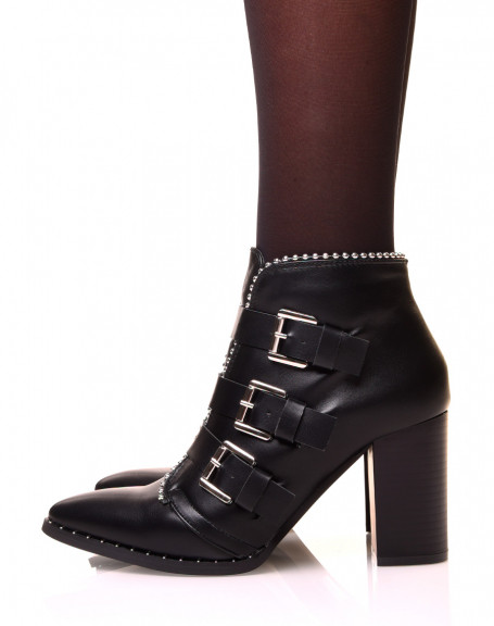 Black heeled ankle boots with multiple studded straps