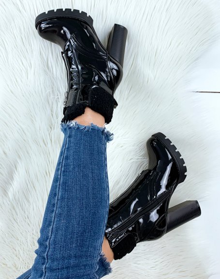 Black heeled ankle boots with patent lining
