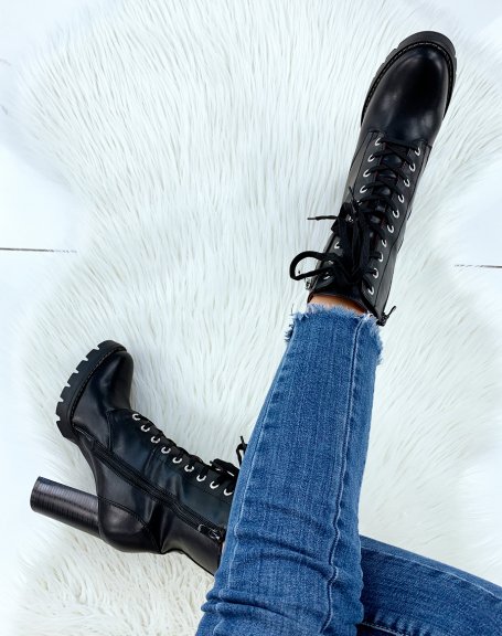 Black heeled ankle boots with small pocket
