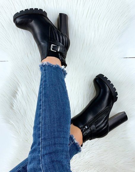 Black heeled ankle boots with strap