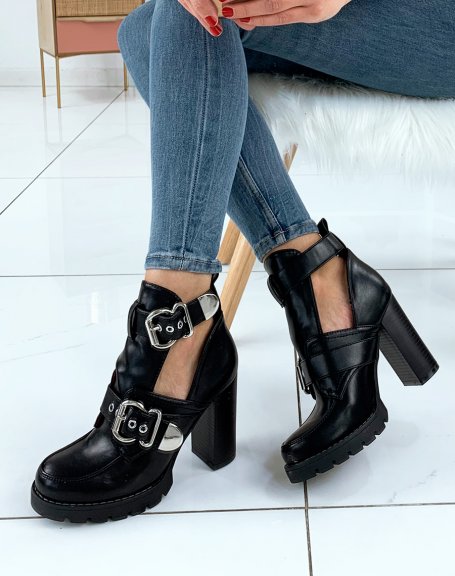 Black heeled ankle boots with straps