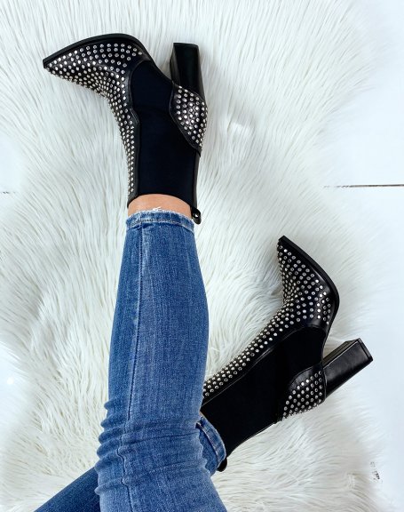 Black heeled ankle boots with studs