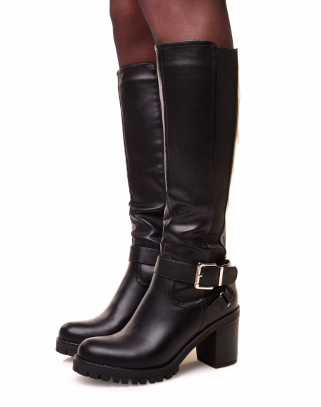 Black heeled boots with lug sole
