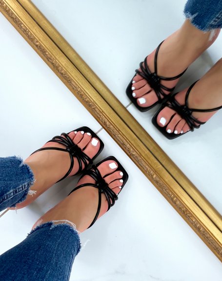 Black heeled mules with criss-cross straps