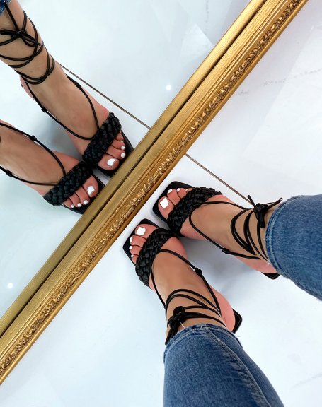 Black heeled sandals with braided strap and long straps