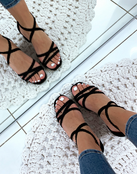Black heeled sandals with braided straps
