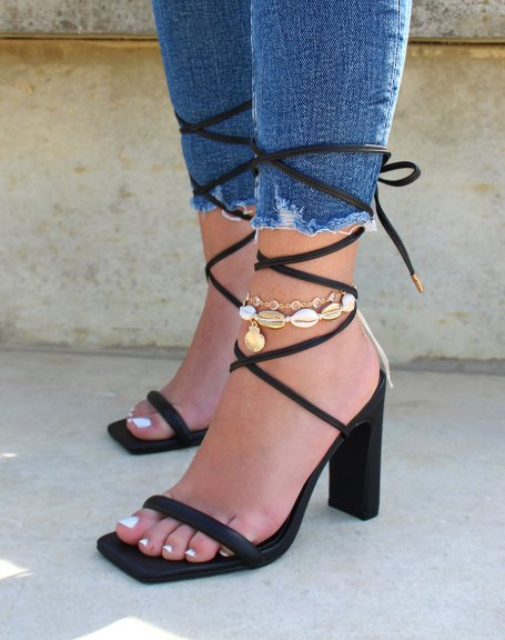 Black heeled sandals with long straps
