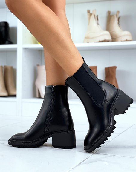 Black heeled square toe ankle boots