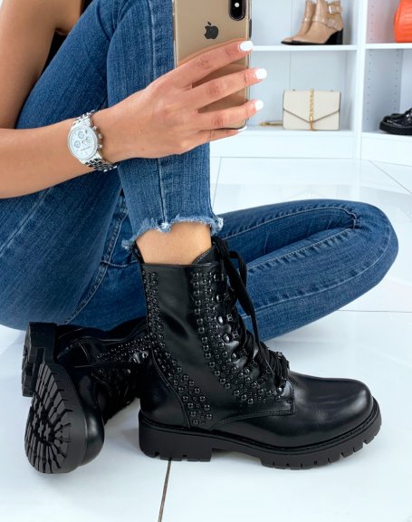 Black high ankle boots adorned with black pearls