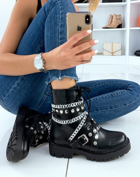 Black high ankle boots adorned with chains and studs