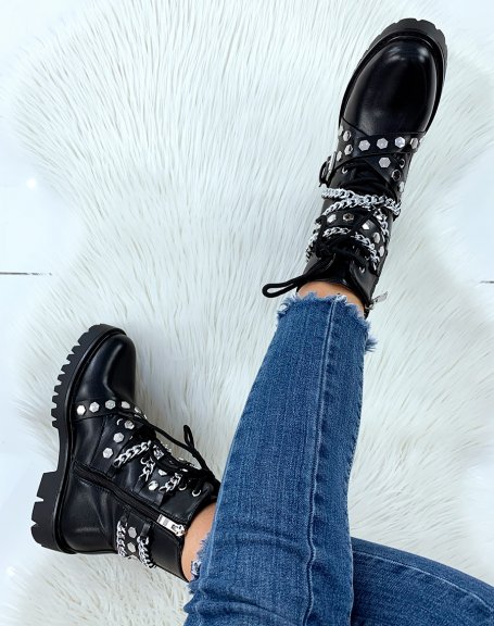 Black high ankle boots adorned with chains and studs