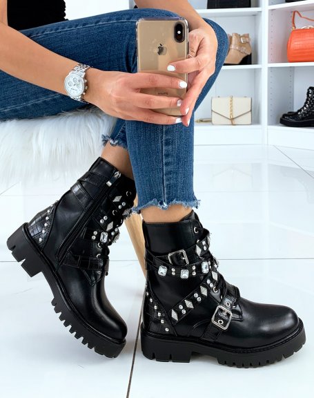 Black high ankle boots adorned with studded straps