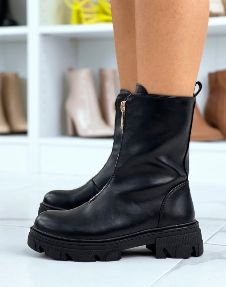 Black high ankle boots with gold closure