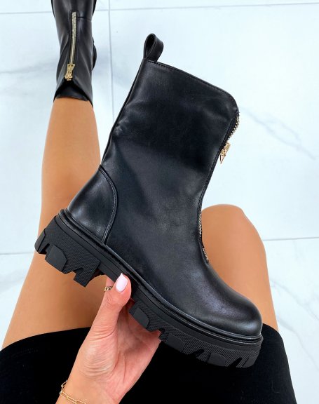 Black high ankle boots with gold closure