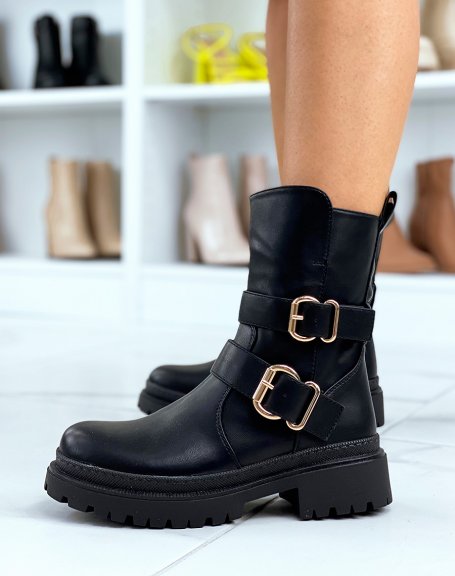 Black high ankle boots with golden buckles