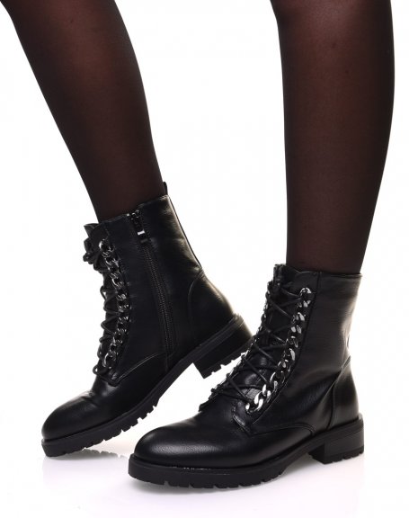 Black high ankle boots with lace and chain details