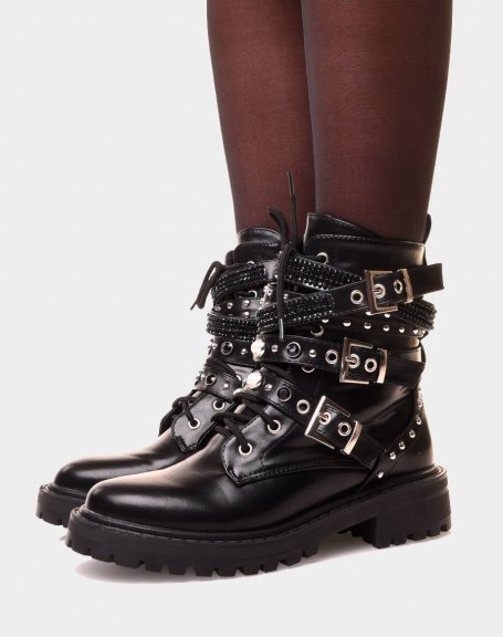 Black high ankle boots with multiple straps adorned with pearls and studs