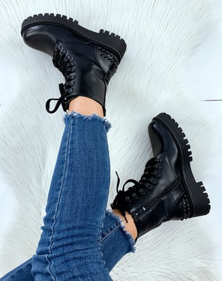 Black high ankle boots with notched sole