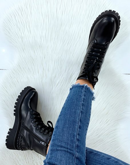 Black high ankle boots with notched sole