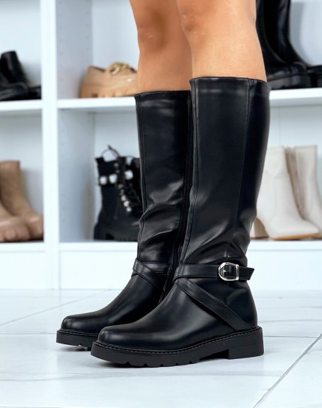 Black high boots with crisscross straps