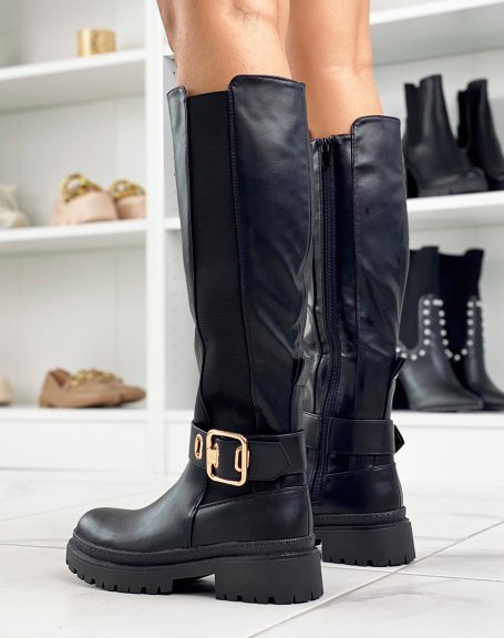 Black high boots with gold buckle