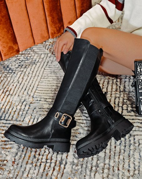 Black high boots with gold buckle