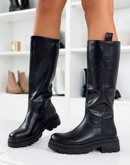 Black high boots with notched sole