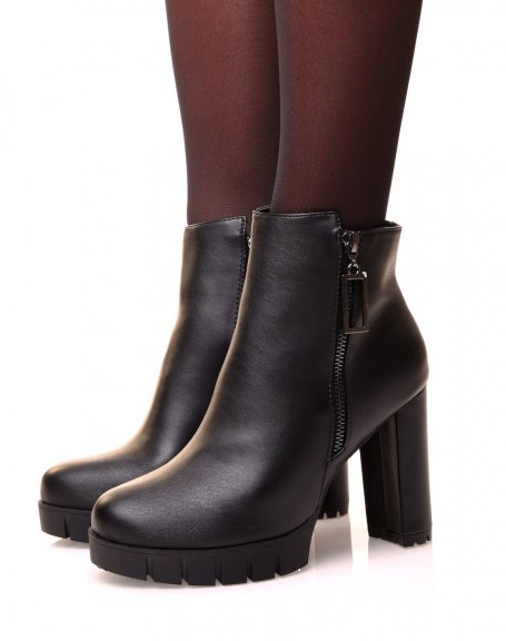 Black high heel ankle boots with decorative zip