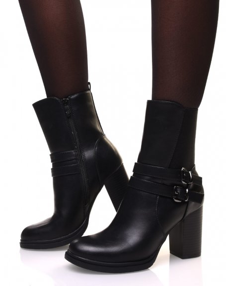 Black high heel ankle boots with straps