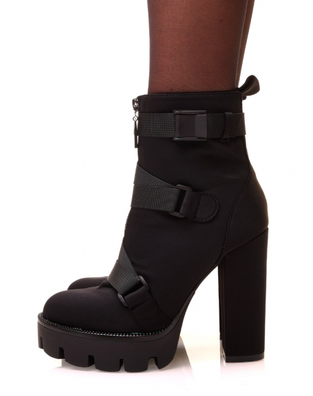 Black high heeled ankle boots with multiple straps