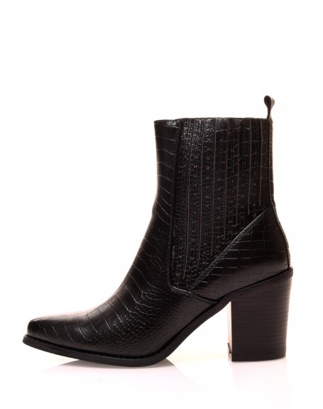 Black high point-toe cowboy boots with decorative stitching