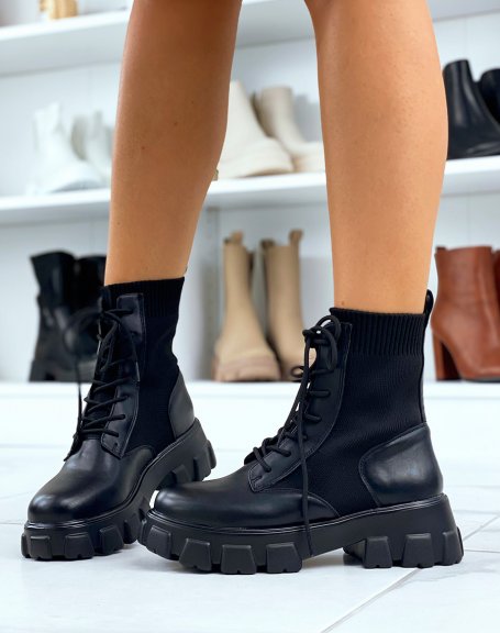 Black high sock-effect ankle boots with notched soles