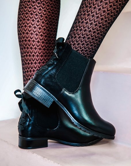 Black knotted Chelsea boots