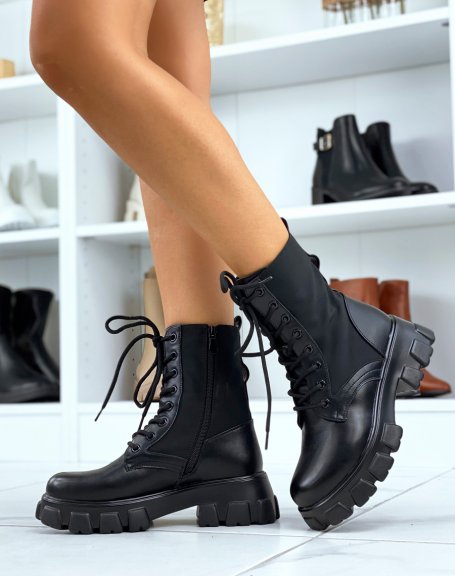 Black lace-up ankle boots in bi-material with pocket and notched soles