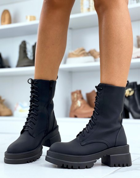 Black lace-up ankle boots with notched heel sole