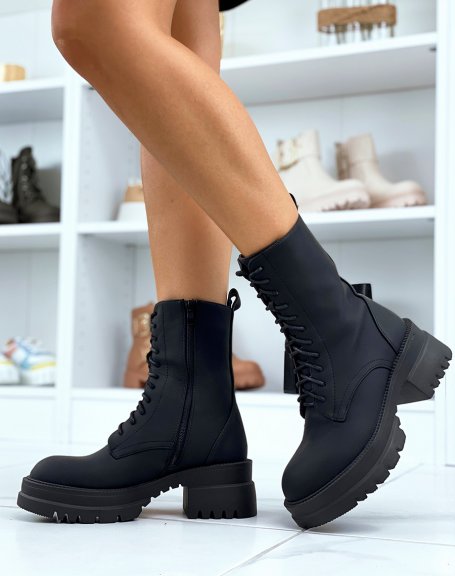 Black lace-up ankle boots with notched heel sole